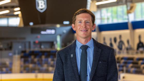 Andy Jones stands in the Hockey Arena