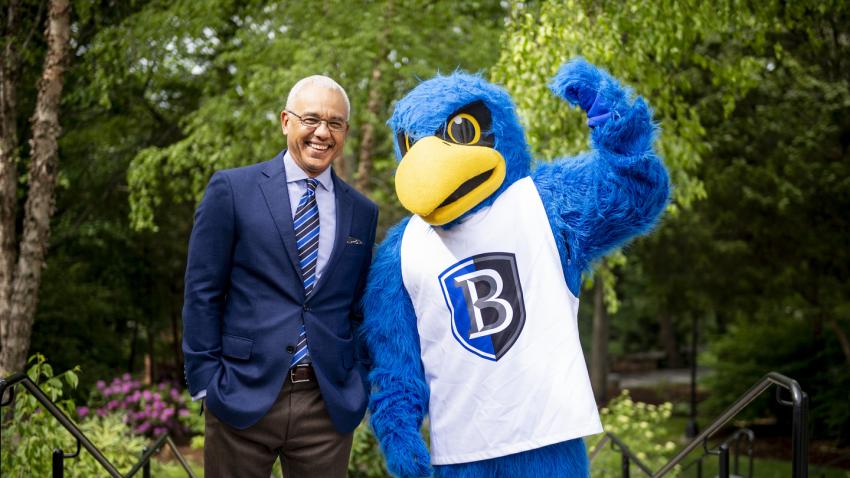 Bentley University President Brent Chrite with Flex the university mascot