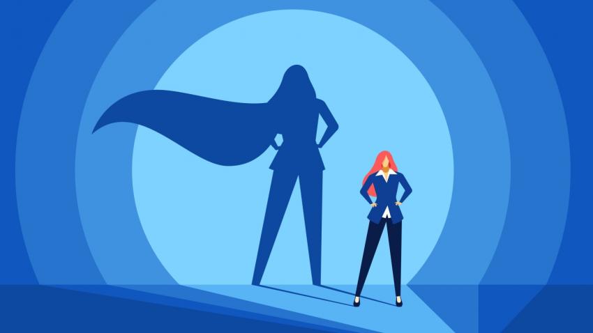 Illustration of female business leader showing her shadow with a cape