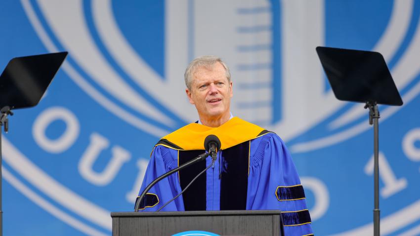 Charlie Baker on stage at commencement