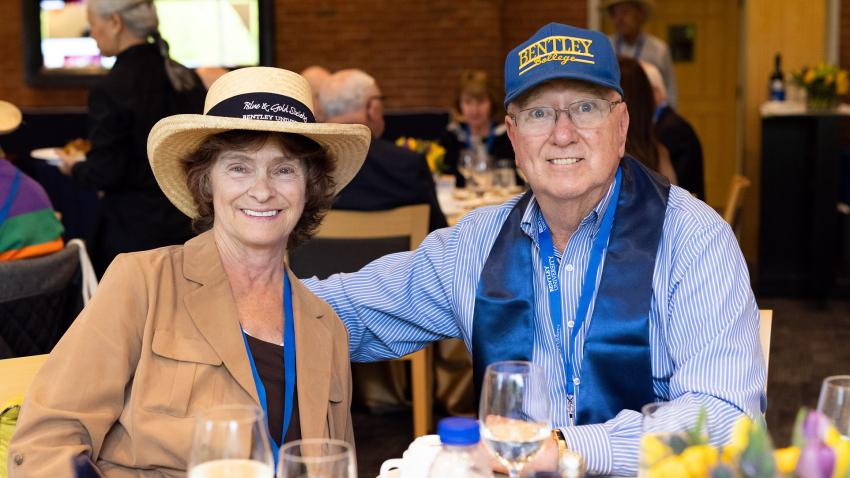 alumni smile during 50th reunion lunch