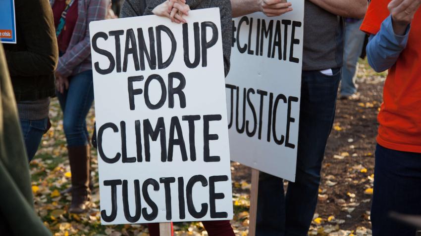 people with climate justice signs