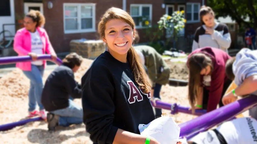 Bentley student helps build a playground