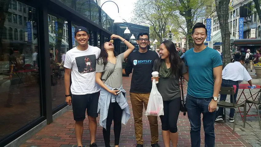 Veronica and four of her friends at Faneuil Hall in Boston