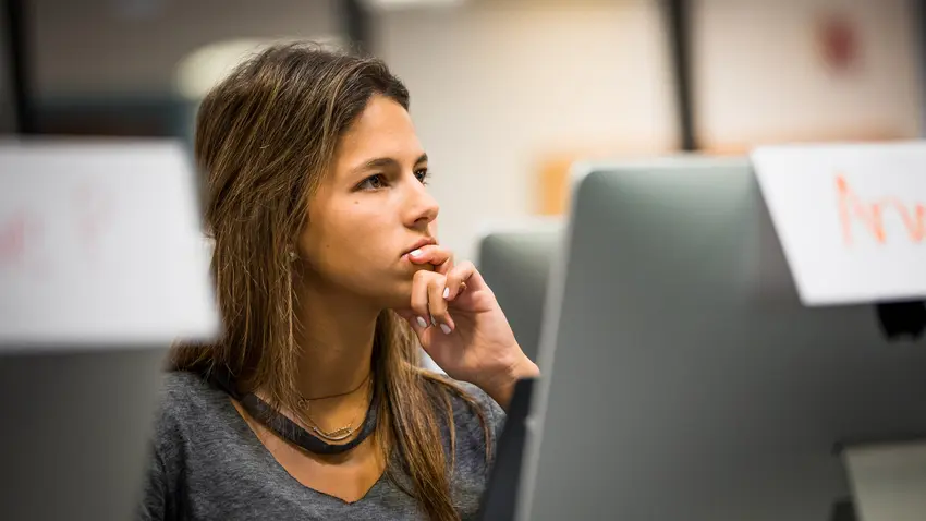 transfer student listens intently in class