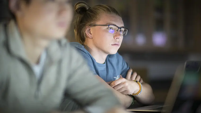 student listens in class