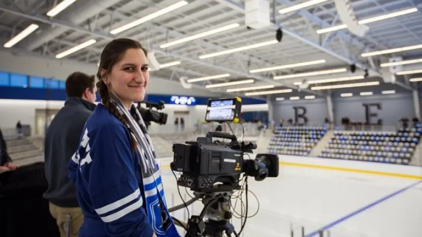 Jillian filming hockey game