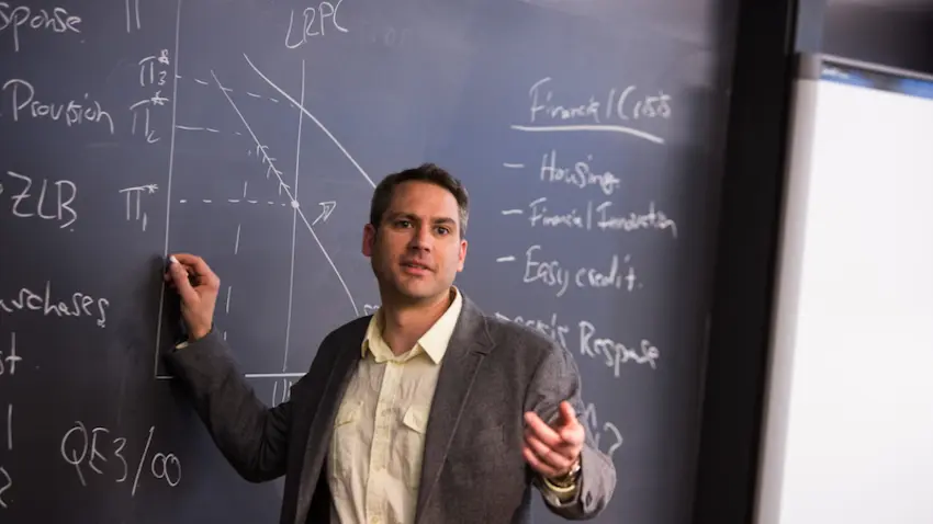 professor aaron jackson teaches in the classroom
