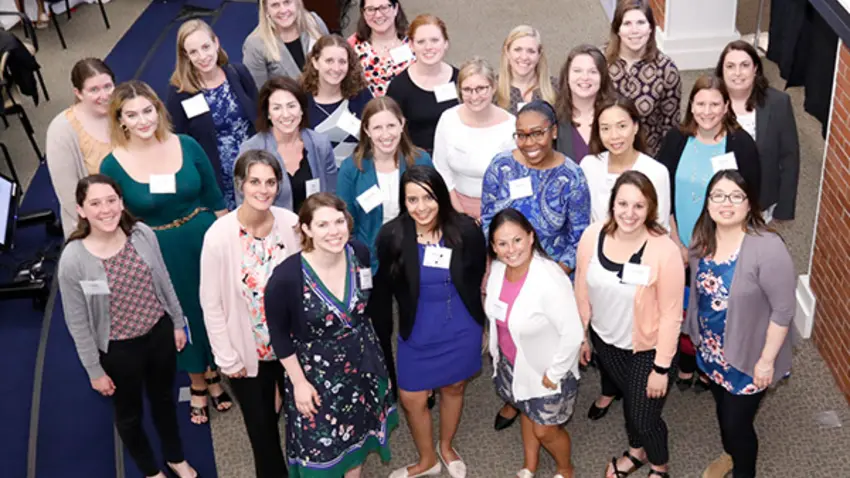 2019 Presenting Sponsor Fidelity Investments employee participants pose together after a successful conference