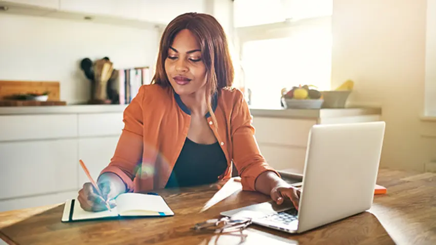 Woman working from home on laptop