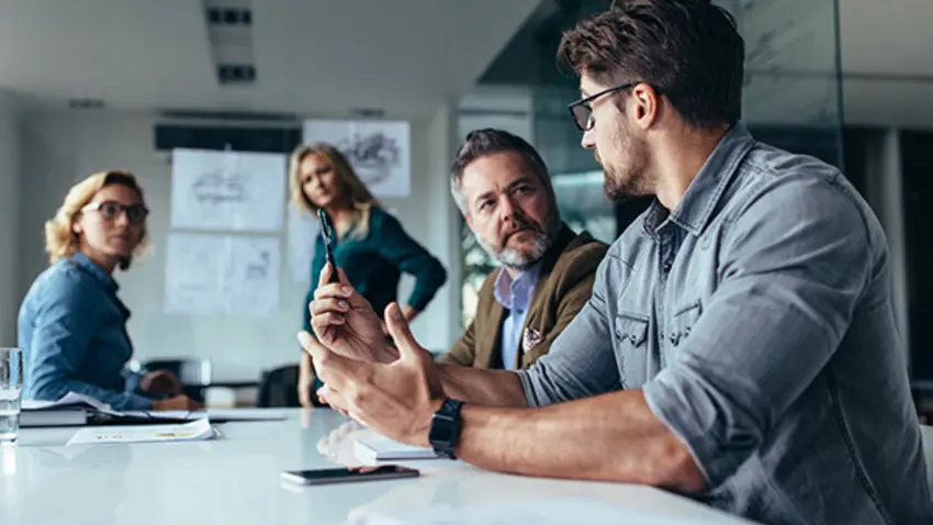 Corporate team listen to idea of project manager