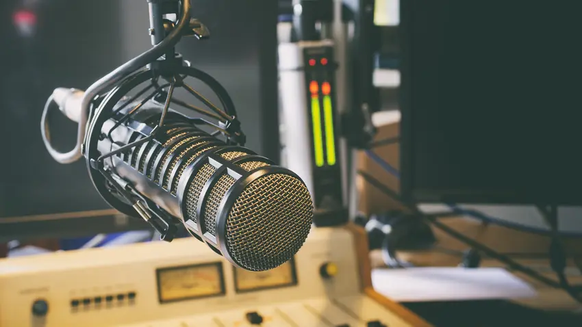 Recording studio with microphone and sound engineering dashboard 