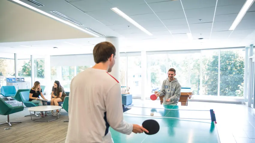 Students playing ping pong