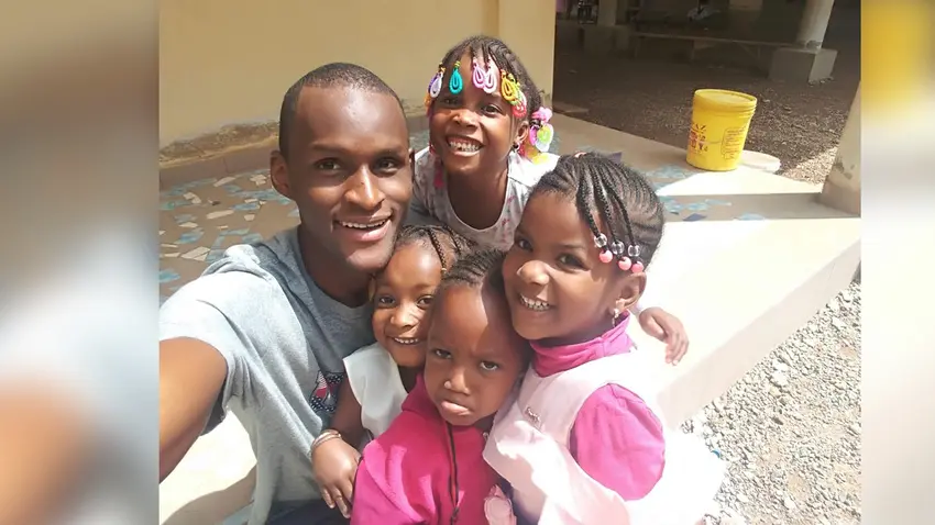 Ahmadou Balde with children in Guinea