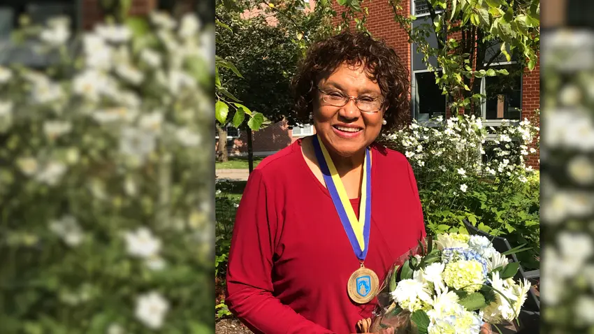 Barbara Paul-Emile with Adamian medal