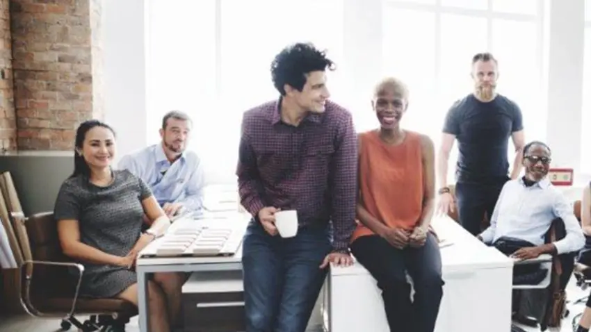 Six Coworkers at their desks