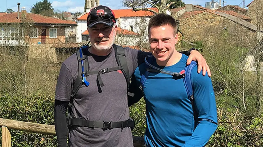Photo of father and son on a hike