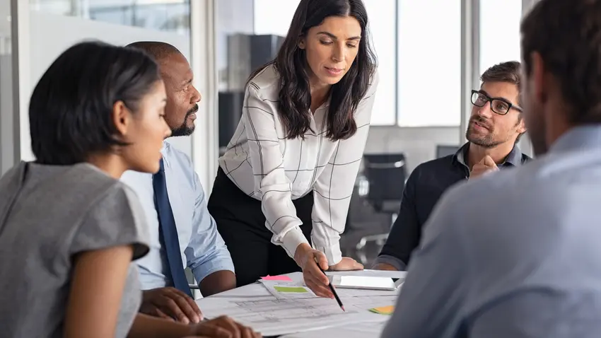 Woman leading business meeting