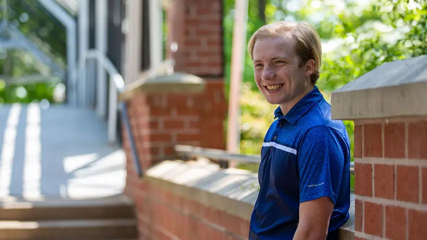 Michael Watkins '22 standing by the Bentley bridge