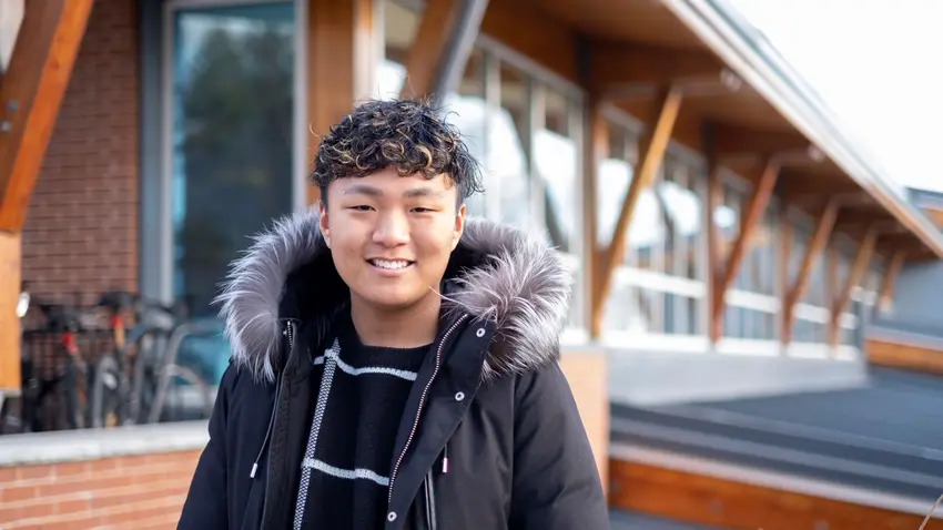 Alex Kim standing outside in winter coat