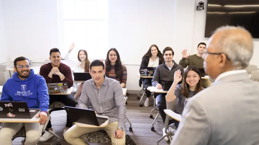 students listening to professor in class