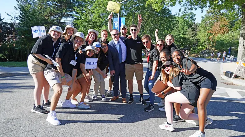 Orientation leaders posing with Dean Shepardson