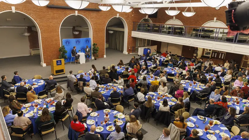 a room of the speaker series audience