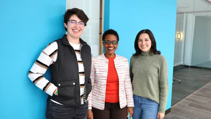 Masters of Accounting Fellows Kaitlyn Arce, left, and Juliana Balladares, right,  pose with faculty mentor Kerri-Ann Sanderson, assistant professor of Accounting.
