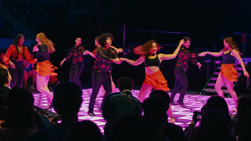 Salsa dancers perform