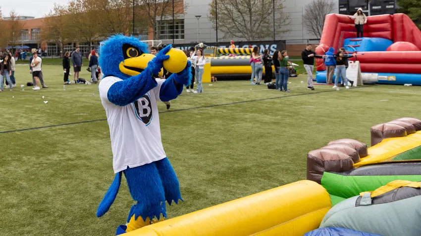 Flex the Falcon mascot at inflatables