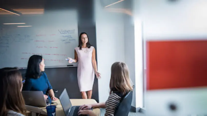 image of professor and students