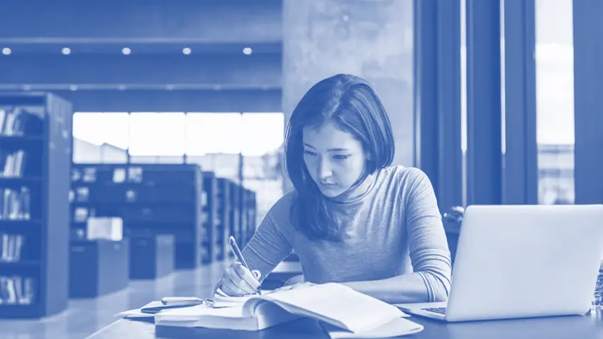 college student in library