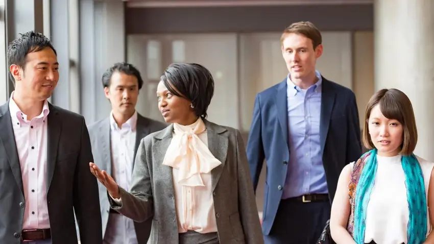 executives walking while talking