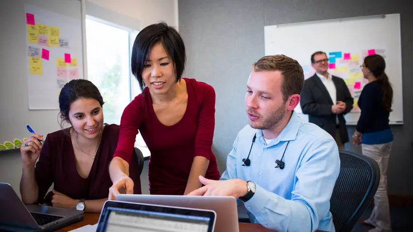 Professor and students in UXC Lab