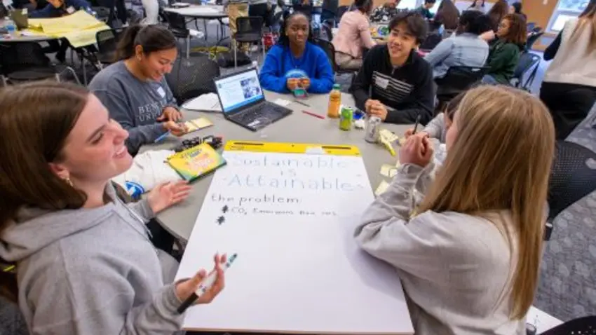 Bentley students with Junior Achievement participants