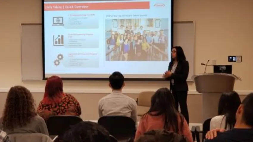 Employer hosting a slide presentation for students