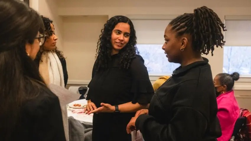 Bentley students and alumni networking during a women of color panel event hosted by Bentley Coming Full Circle