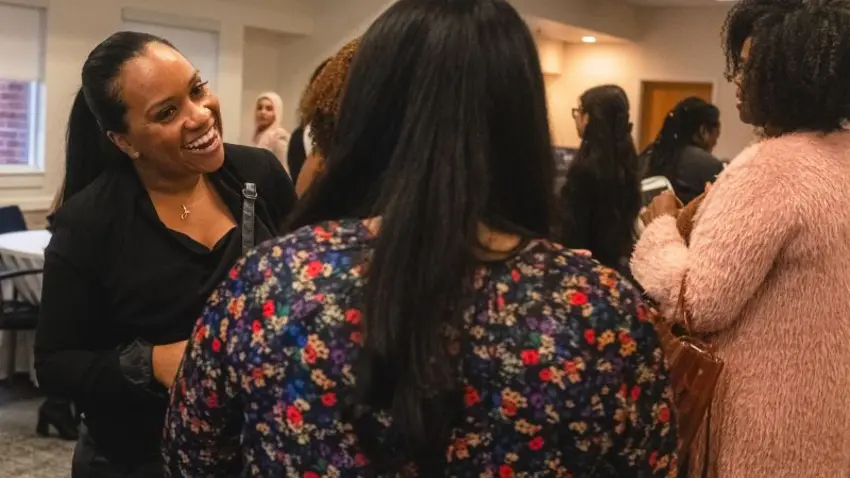 Bentley students and alumni networking during a women of color panel event hosted by Bentley Coming Full Circle