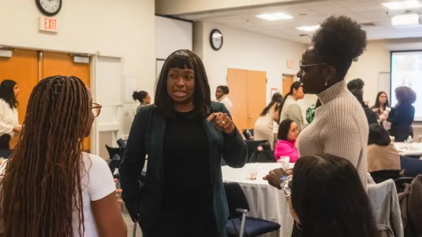 Bentley students and alumni networking during a women of color panel event hosted by Bentley Coming Full Circle
