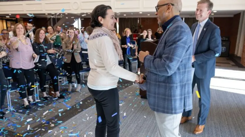 President Chrite handing out the Founder's Day Award