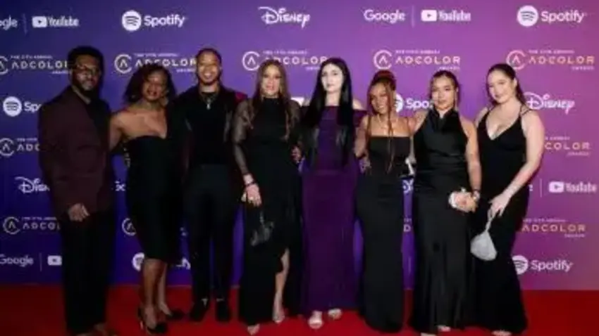 Bentley students and alumni at ADCOLOR event in black evening wear