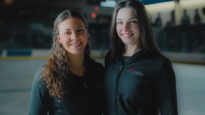 Bentley students Autumn Coulthard, left, and Elly Monaco, right, pose in the Bentley Arena.