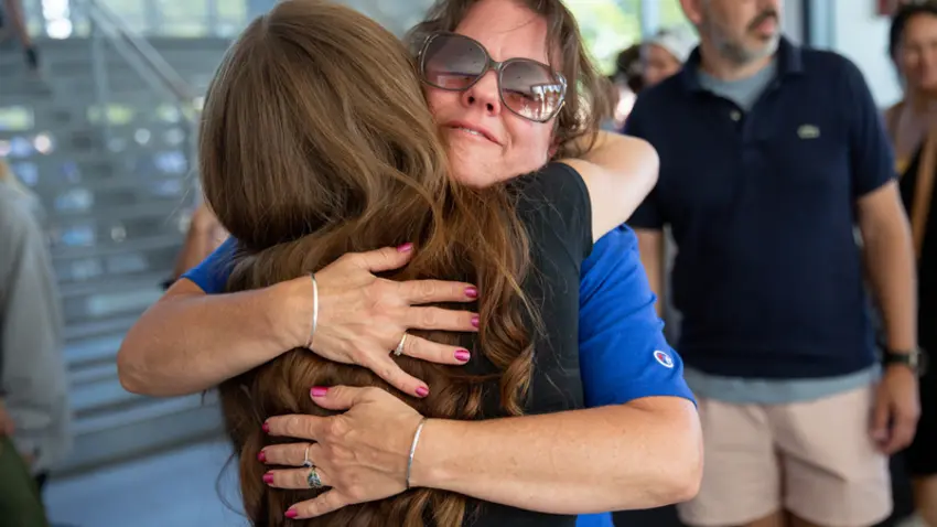 Mother and daughter hugging at convocation
