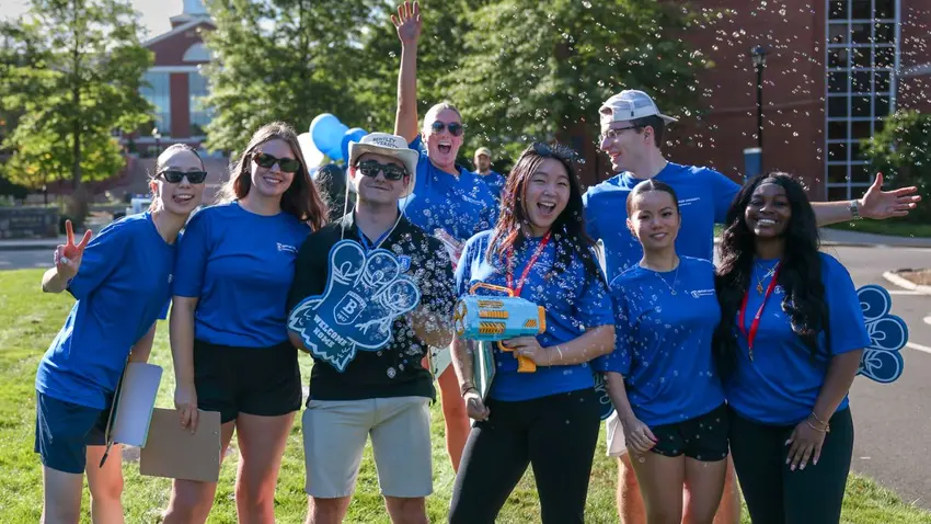 Group of Bentley student volunteers gather during move-in day