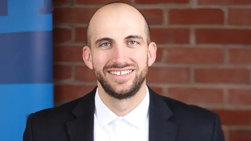 Headshot of Economics professor Sacha Gelfer