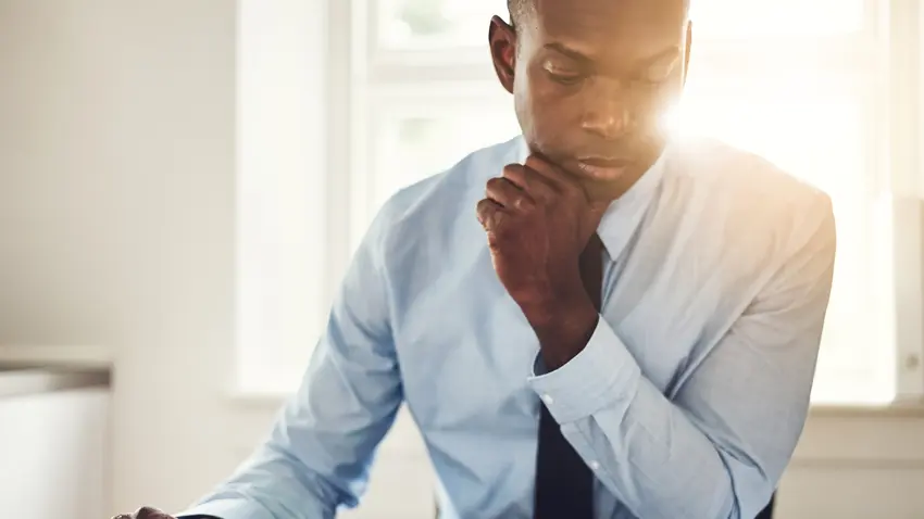 Man working on financial documents