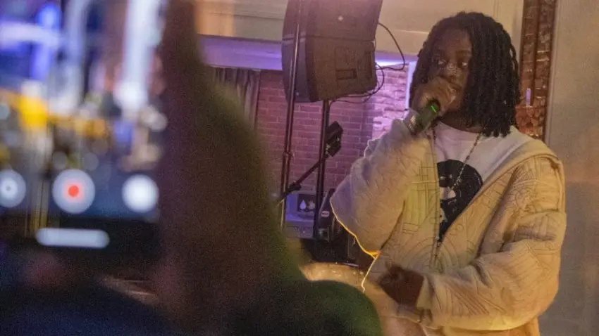 Wolfacejoeyy interacts with the crowd at Bentley's Black History Month concert