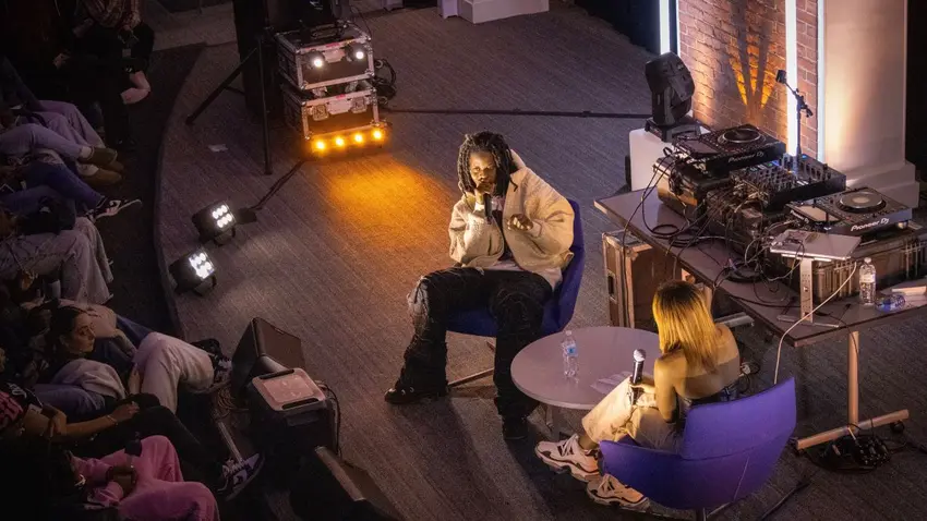 Jaychele Nicole Schenck interviewing Wolfacejoeyy at Bentley's Black History Month concert