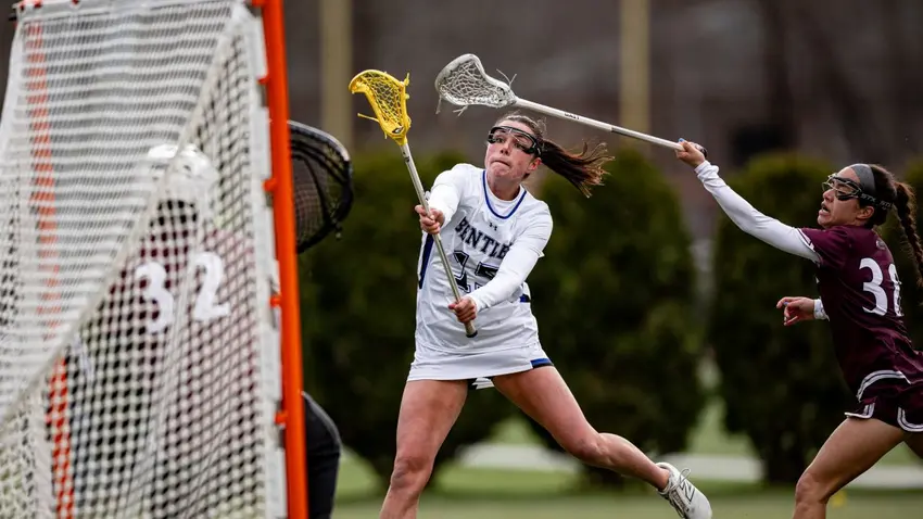 Bentley Women's Lacrosse player Amber Kiricoples takes a shot on goal during a game