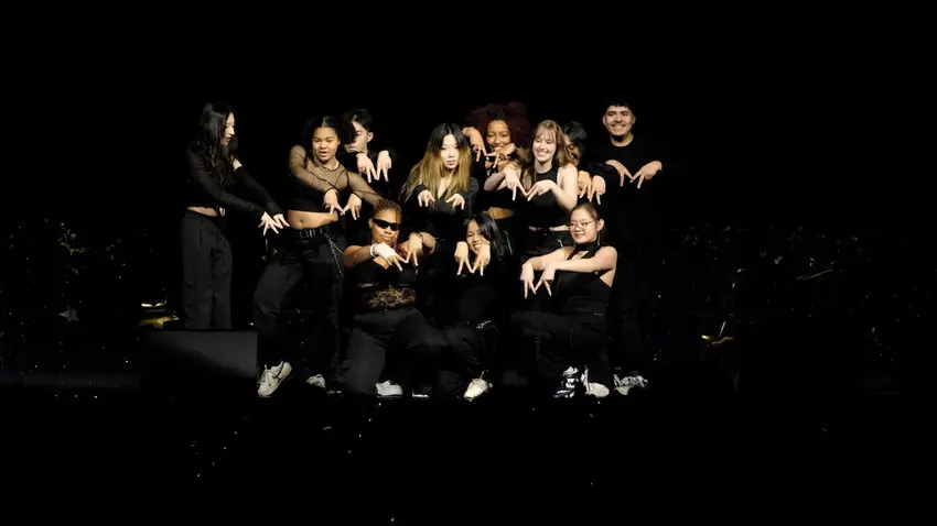 Performers pose on stage at the Asian Culture Gala, sponsored by the Bentley Asian Students' Association
